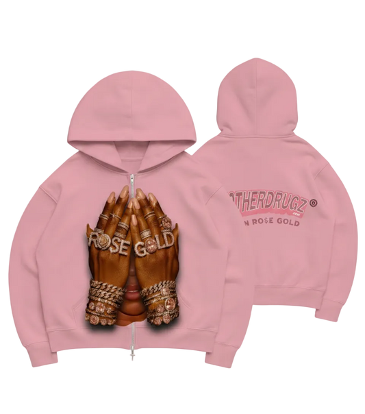 Pink hoodie with 'Rose Gold' and 'Otherdugz' text on a light gray background